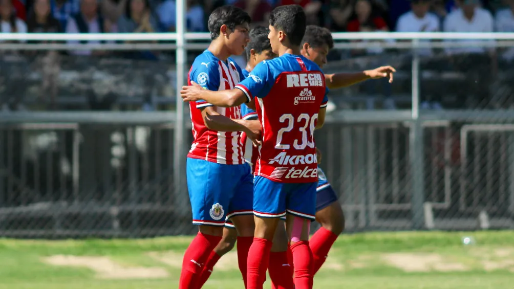 Jugadores del Rebaño festejan una anotación