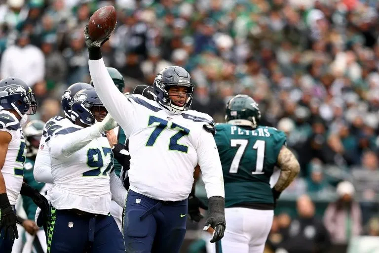 Al Woods celebra tras recuperar el ovoide