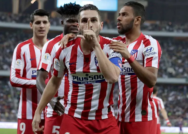 AP Koke festeja su gol ante el Barcelona en la Supercopa de España