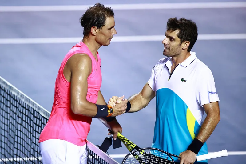 IMAGO7 Rafa Nadal y Pablo Andújar se saludan