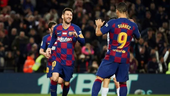 Messi y Suárez en festejo de gol