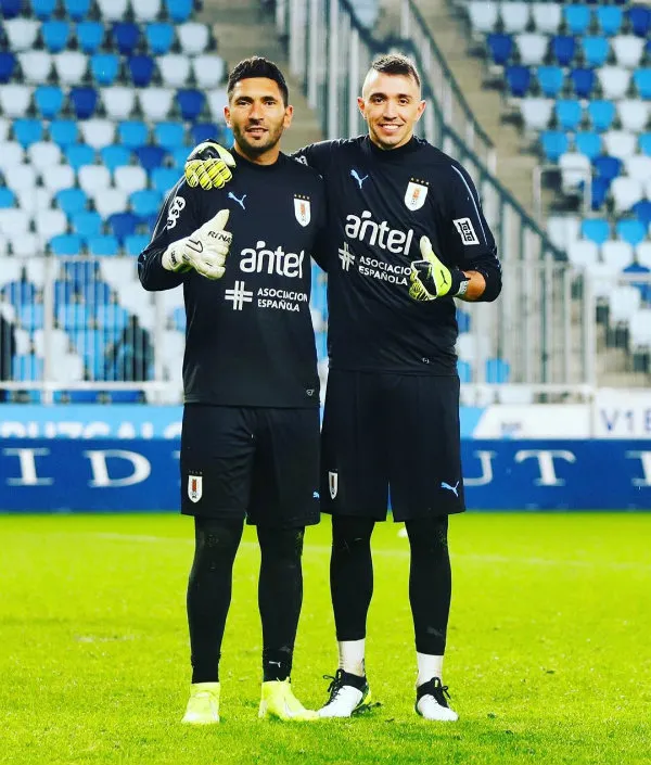 Martín Campaña y Fernando Muslera con Uruguay