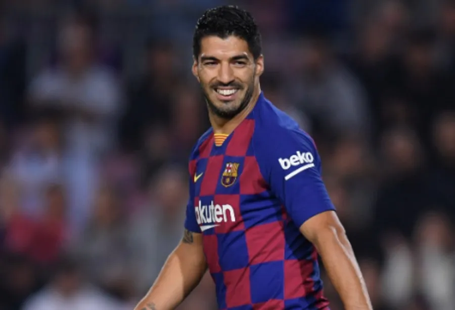 Suárez en un juego con Barcelona