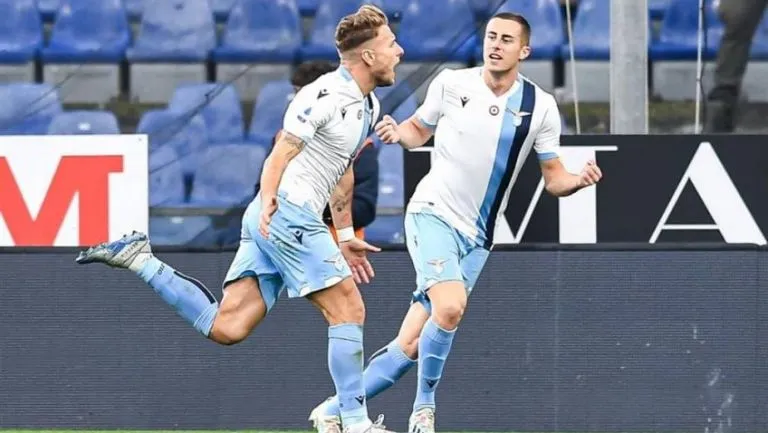 Ciro Immobile celebra con Marušić el segundo gol