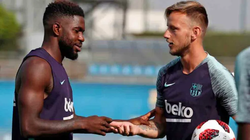 Ivan Rakitic y Samuel Umtiti en entrenamiento