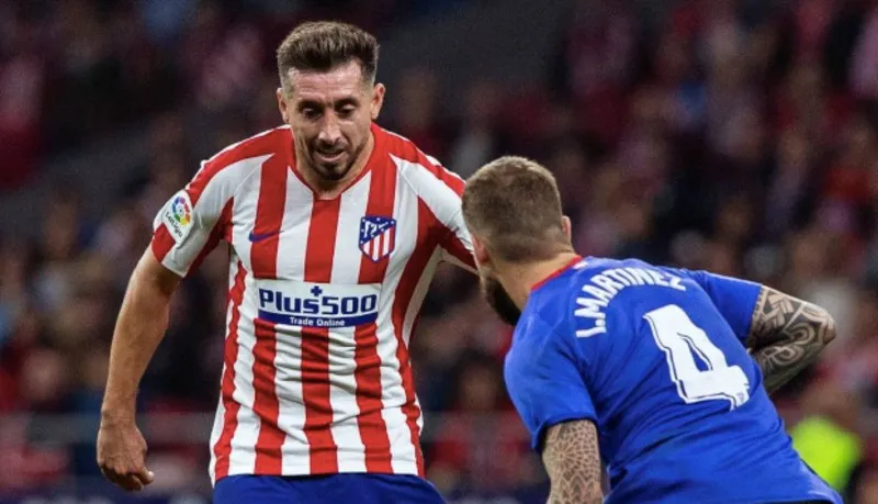 Herrera en un juego con el Atlético