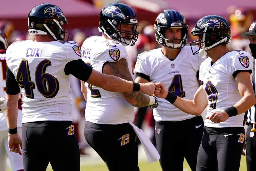 Jugadores de Ravens celebran TD vs Washington