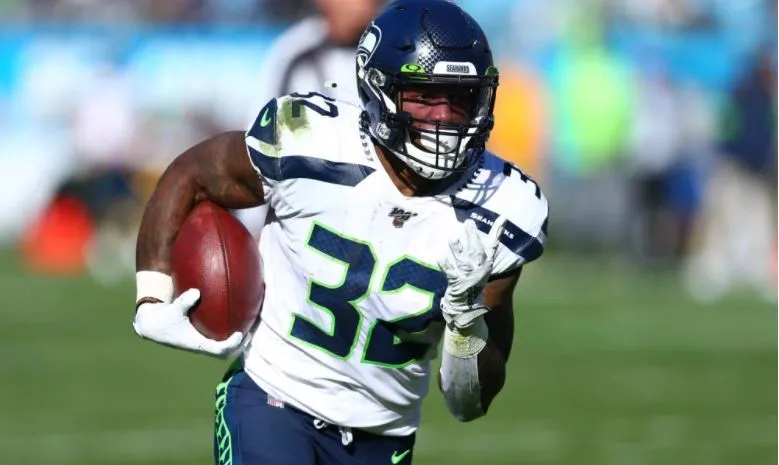 ESPECIAL Chris Carson en acción con Seattle Seahawks