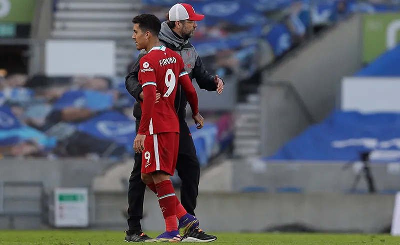 Roberto Firmino y Klopp tras el empate en Premier