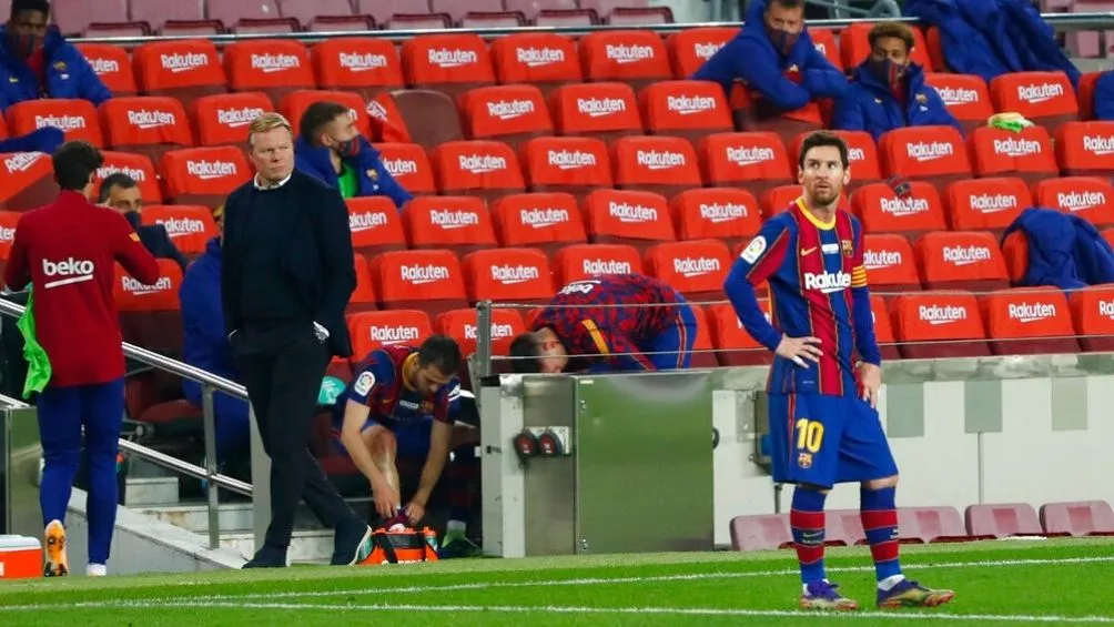 Koeman y Messi en un partido con el Barcelona