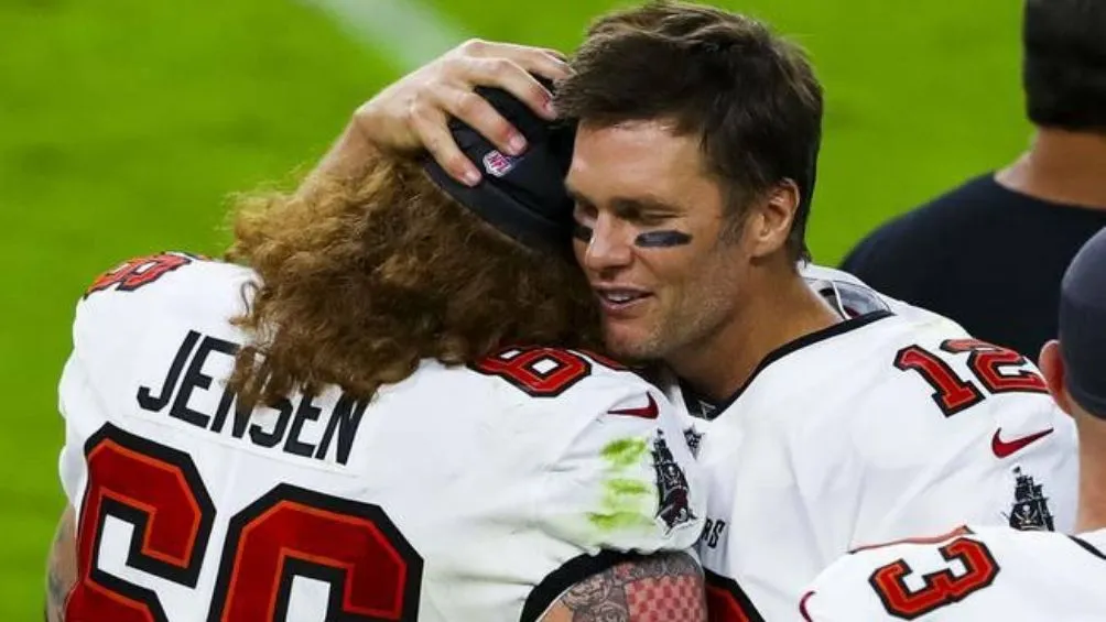 AP Jensen y Brady en un partido