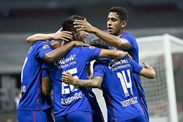 IMAGO7 Jugadores de La Máquina tras una anotación