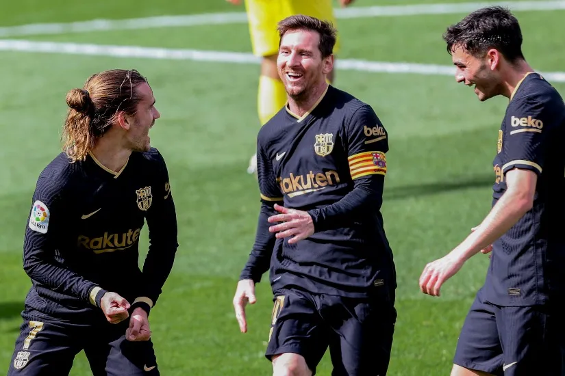 AP Messi y Griezmann festejando el segundo gol del Barcelona