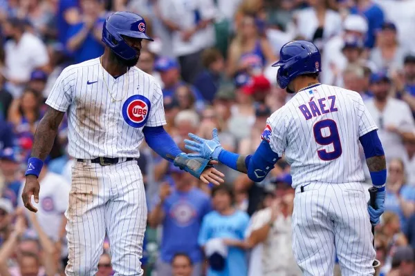 AP Javier Báez en acción con los Cubs