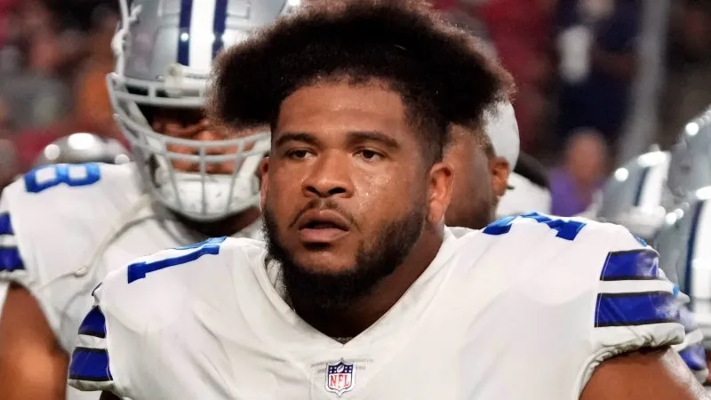 AP La'el Collins en un partido con los Cowboys