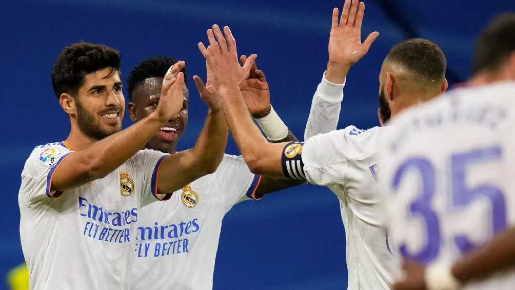 Asensio y los jugadores del Real Madrid festejando