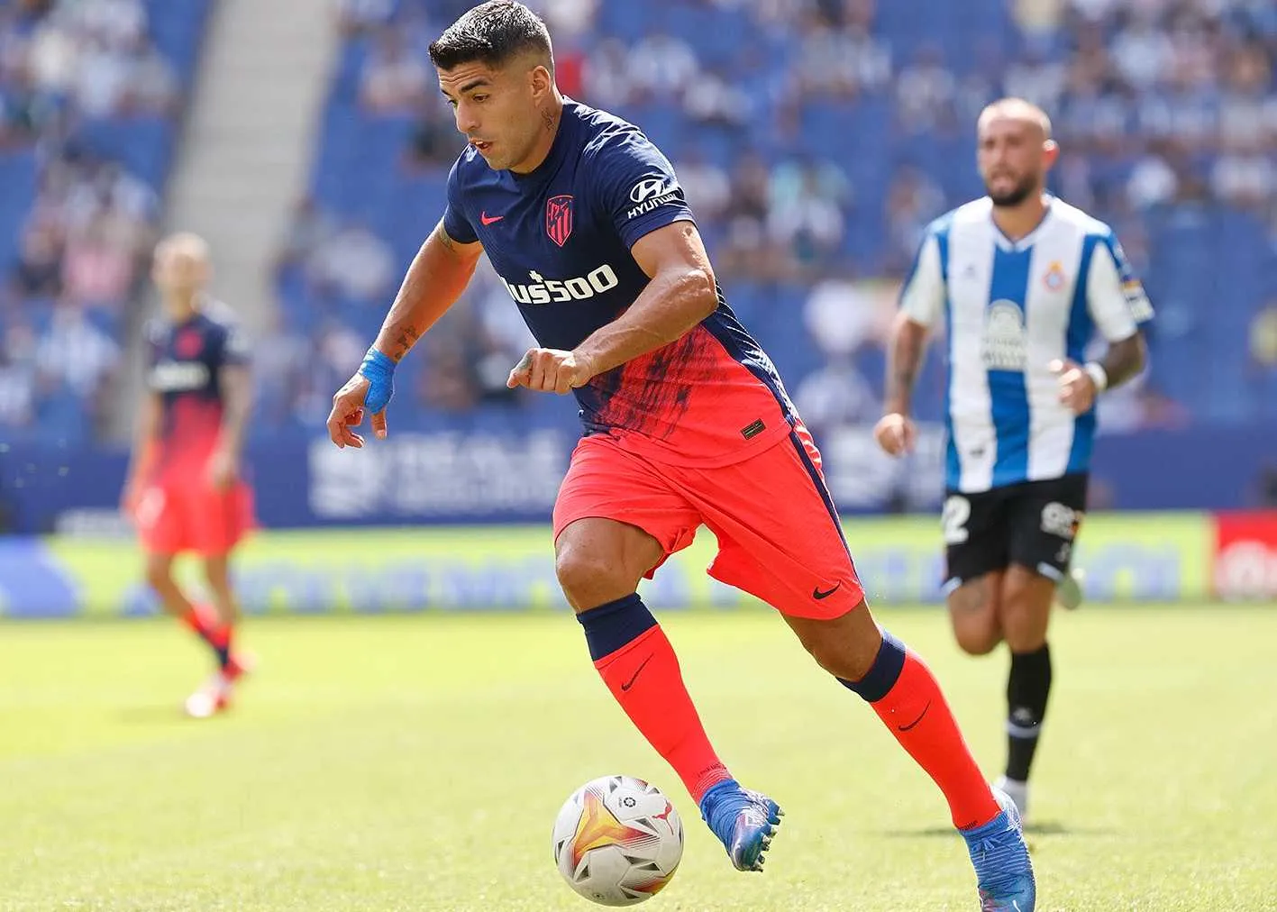 Luis Suárez en un partido con el Atlético