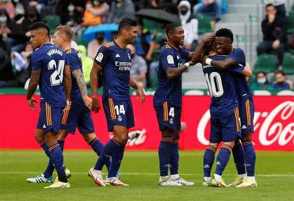 Jugadores merengues en festejo