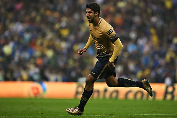 Eduardo Herrera festeja su gol ante América