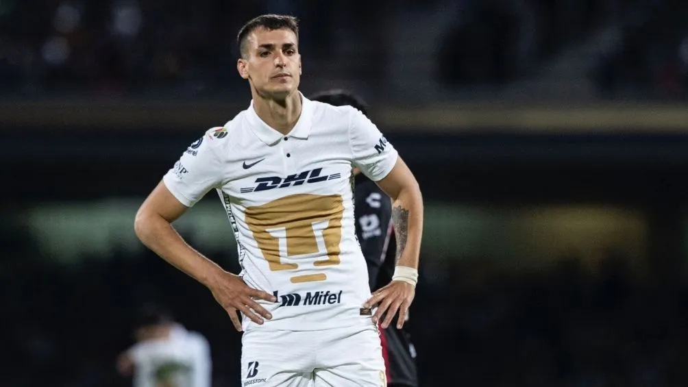 Dinenno en el partido con Pumas