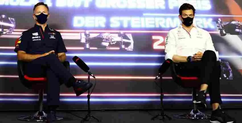 Toto Wolff y Chris Horner en una entrevista