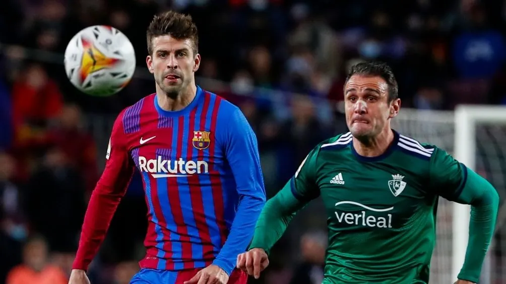 Piqué en un partido con el Barcelona