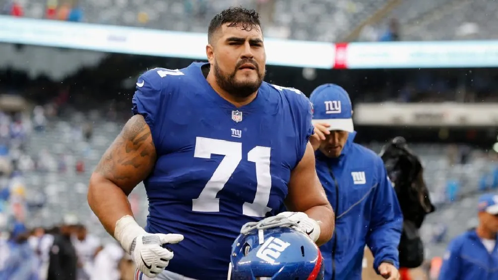 William Hernández jugando partido de la NFL con os New York Giants
