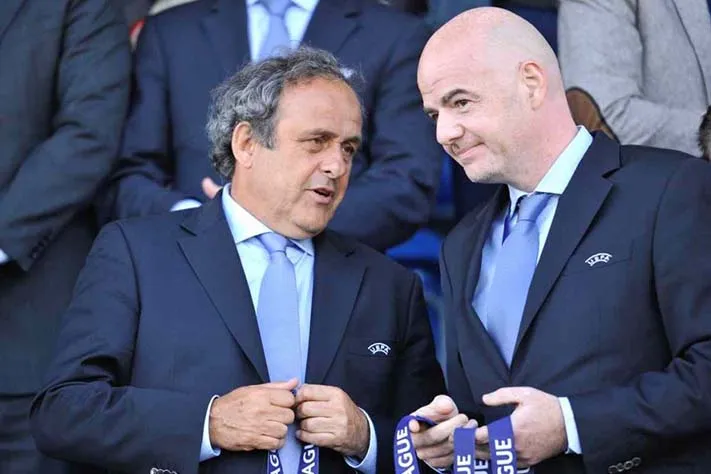 AP Michel Platini y Gianni Infantino