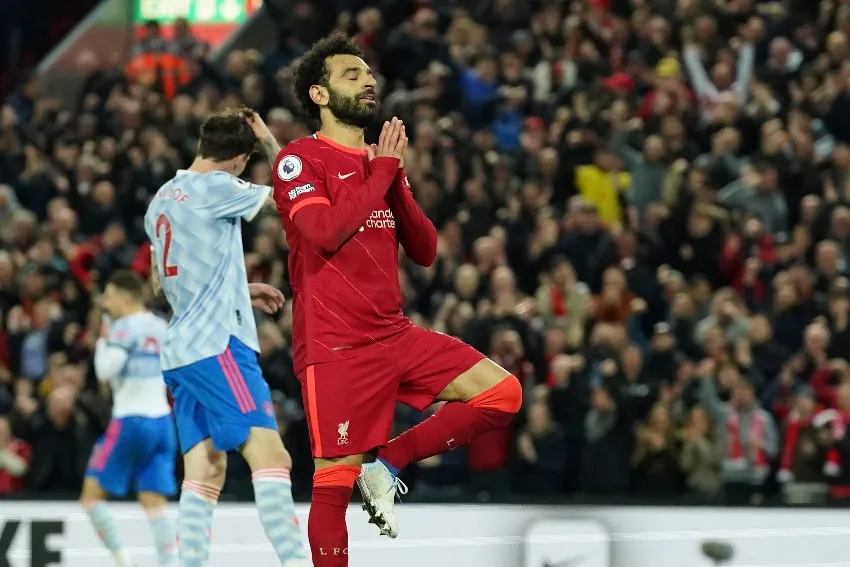 Mo Salah celebrando el triunfo de Liverpool