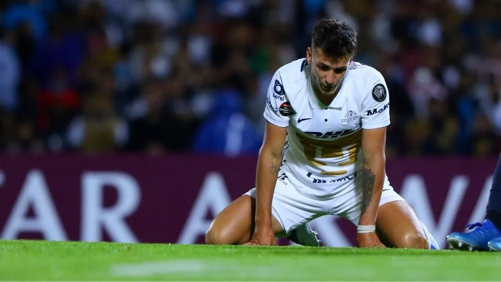 Dinenno en el partido con Pumas