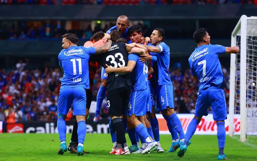 Jugadores de La Máquina celebran el pase a la Liguilla
