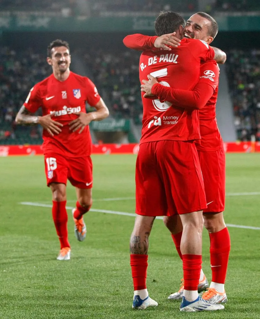 De Paul festejando su gol con Griezmann