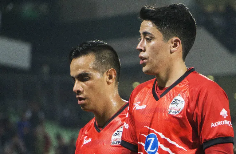 Heriberto Olvera y Eduardo Tercero jugando con Lobos Buap