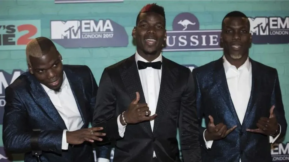 Paul Pobga y sus hermanos