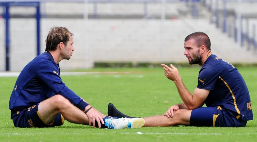 Romagnoli y Villa en entrenamiento