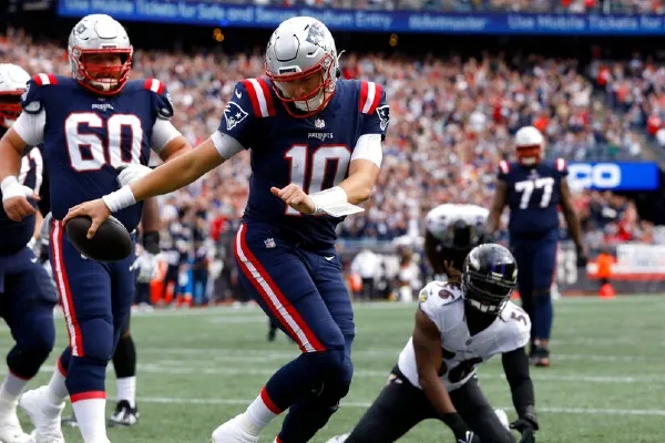 Jones festejando un TD