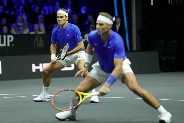 Nadal haciendo dobles con Roger Federer