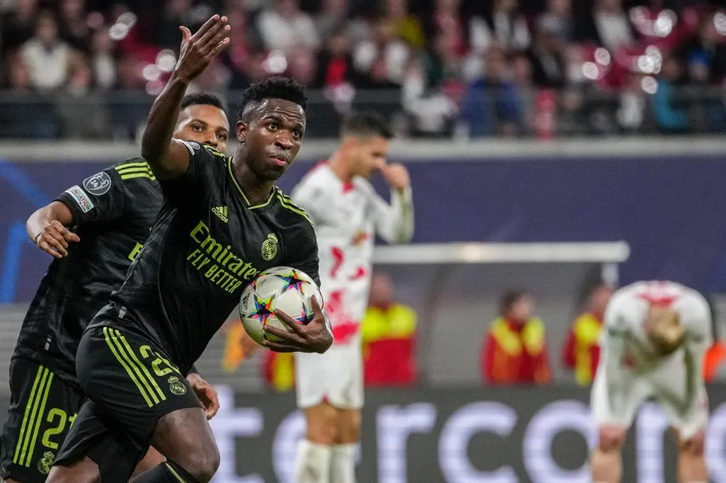 AP Vini tras anotar en Champions