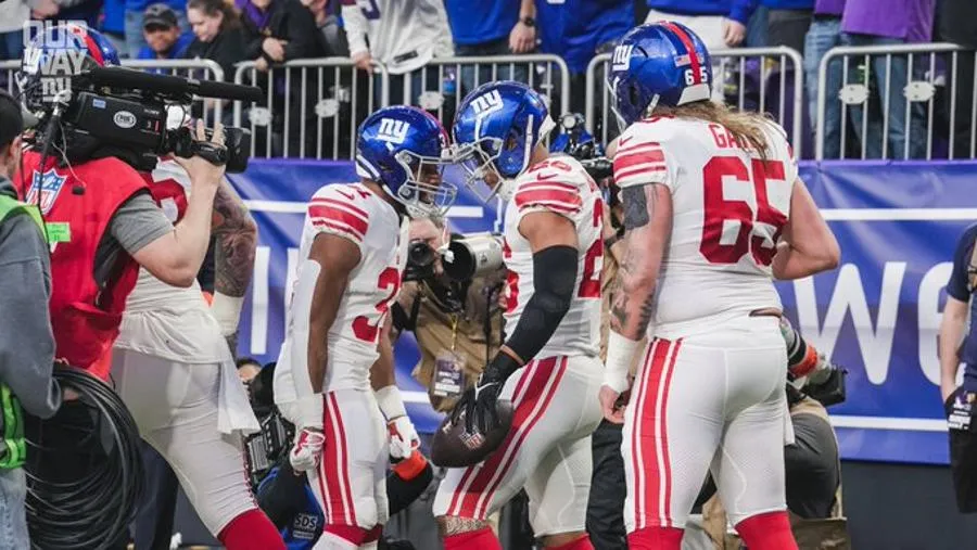 Los Giants celebrando la victoria a Minnesota