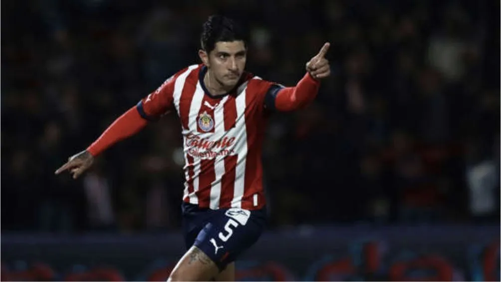 Guzmán como jugador del Rebaño Sagrado