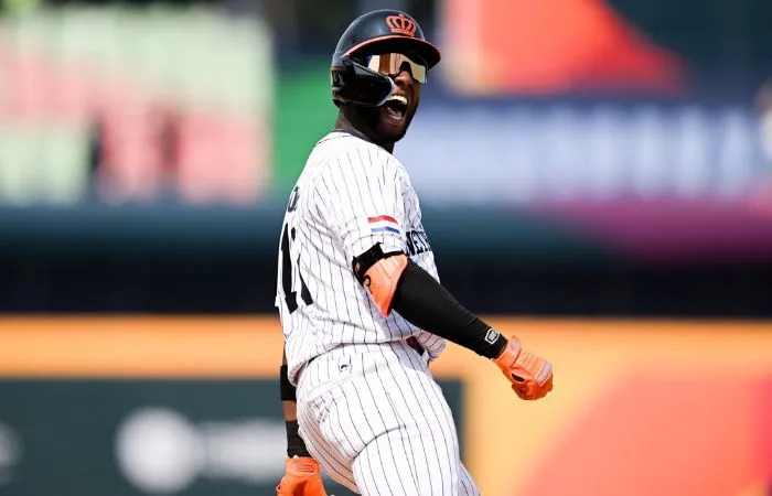 Jurickson Profar festejando su cuadrangular ante la selección de Panamá