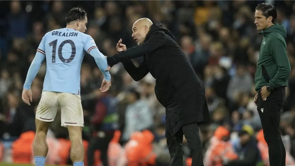 Pep junto a Jack Grealish