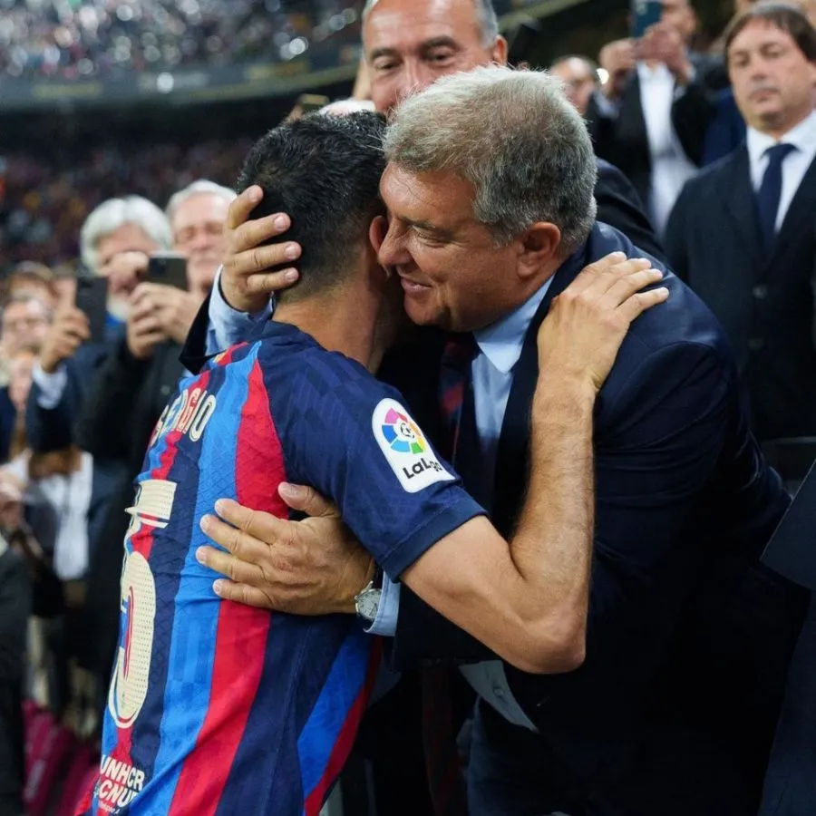 Joan Laporta y Sergio Busquets