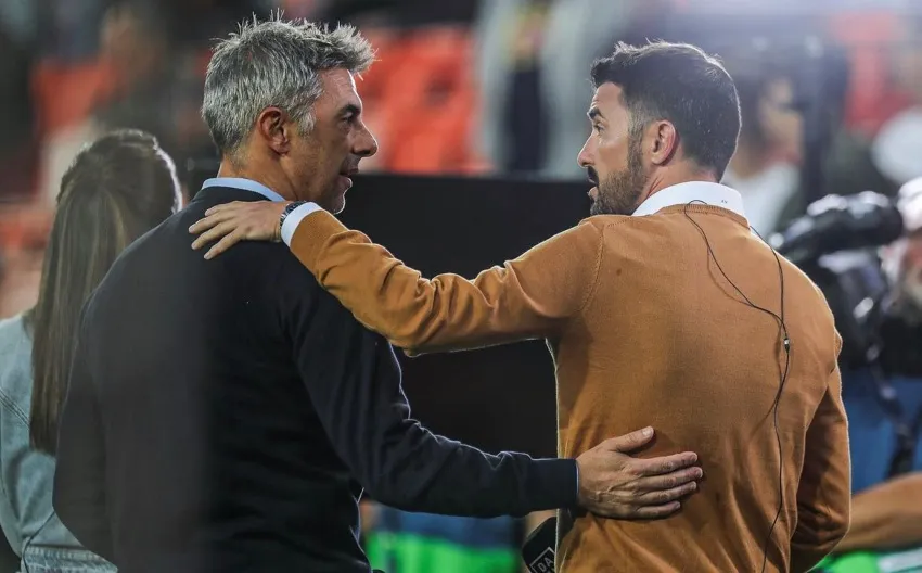 Piojo López con David Villa