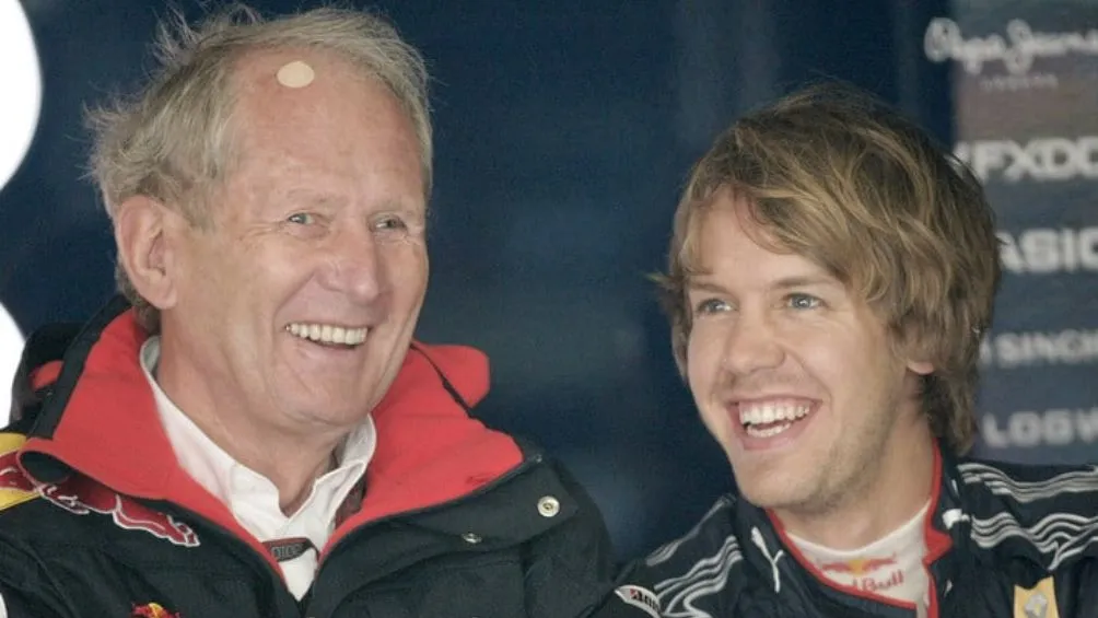 Vettel junto a Helmut Marko