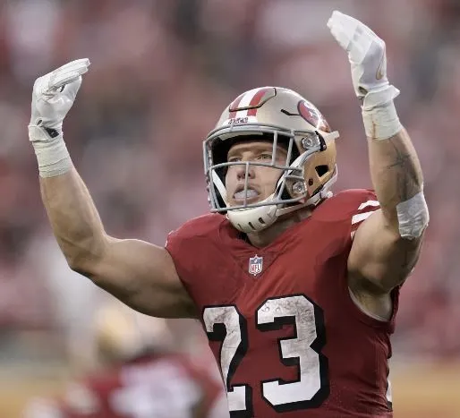 Christian McCaffrey celebra tras una jugada