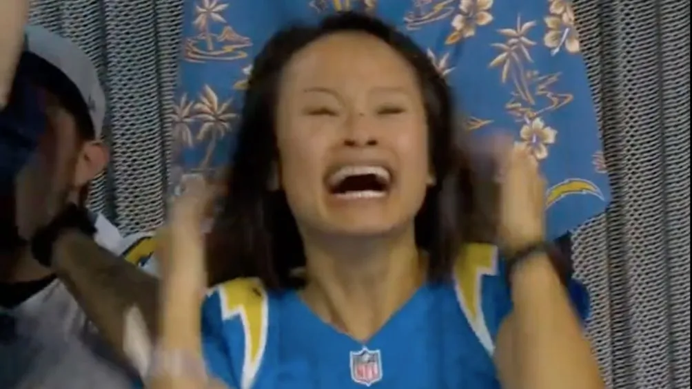 FOTO TOMADA DEL VIDEO La mujer celebrando el TD de Herbert