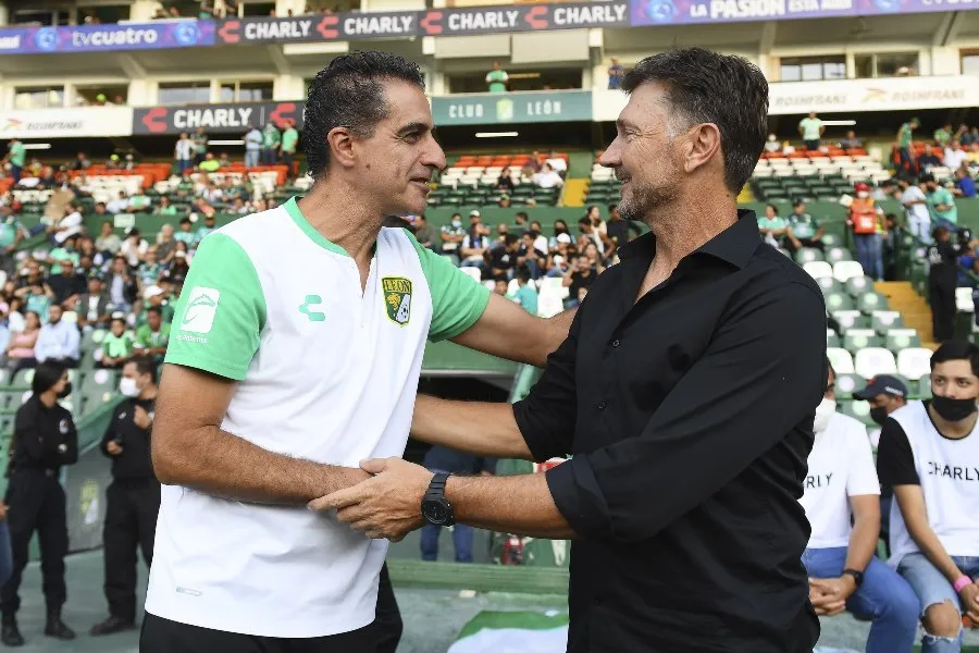 Renato Paiva con Hernán Cristante