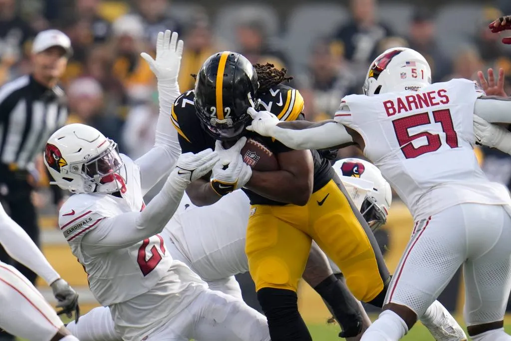 AP Najee Harris quitandose tackleadas