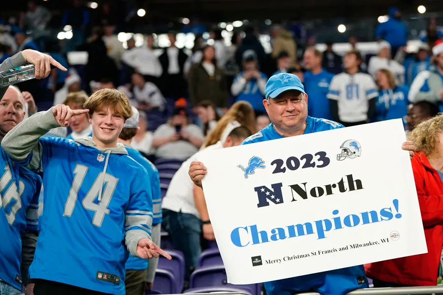Los aficionados de los Lions celebran el título divisional